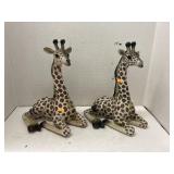 Pair of resin giraffe figures