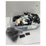 Container of dominoes