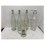 Capped bottles and Bacardi mug