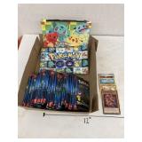 Pokeï¿½mon game cards and zippered bags