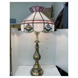 Metal base stained glass shade lamp