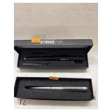 2 cnt Pens - (1 says StrikePen)