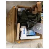 Box of assorted items, pants, Fish container,