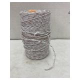 Spool of string with wire woven in