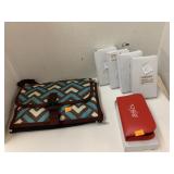 5 travel, sewing kits and a changing pad