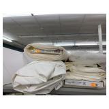5 Bolts of fabric and bolt of tracing cloth