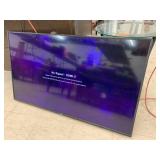 Vizio Tv, turns on, no remote, with wall mount