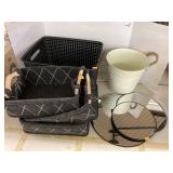 Baskets, bucket, and hanging mirrors