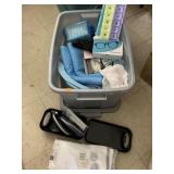 Tote of pillboxes, towels, razor, misc