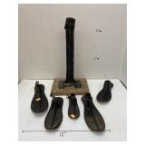 Antique cast iron cobblerï¿½s stand and shoe forms