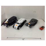 3cnt model Cars (one missing front?) and 1 Maisto