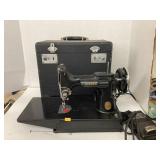 Singer sewing machine & case (motor runs, take up