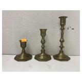 Trio brass candlesticks