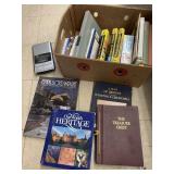 Box of books and cassette player