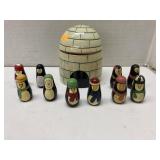 Wooden igloo & penguins