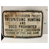 Metal wildlife restoration sign
