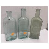 3 Vintage Embossed Glass Medicine Bottles