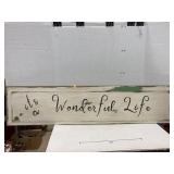 Double sided sign with two sayings
