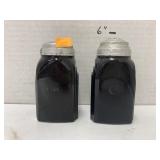 Vntg black glass S/P shakers (1 lid damaged)