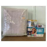 Blanket, curlers, blood pressure monitor,