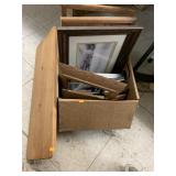 Pictures, frames, wooden shelf