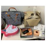 2 boxes of doll stands, bag, misc