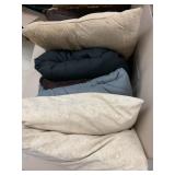 Box of pillows and blankets