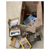 Box of Pearl Harbor DVD, Puzzle books, misc
