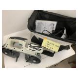 Portable band saw with battery and charger