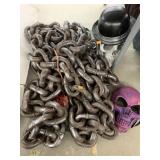 Plastic chain, skull masks, and skeleton decor