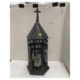 Metal lantern with candle
