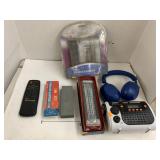 Sharpening stone, thermometer, misc