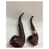 2 Pipes - One marked WD Wellington