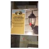 Motion sensing exterior wall lantern