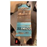 Adventure begins sign