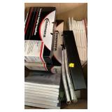 Box of calendars, planners, and monochrome lasers