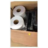Box of large toilet paper rolls and file