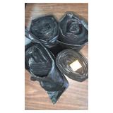 4 rolls of black trash bags