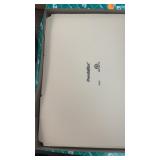 Box of file folders and a box of white envelopes