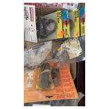 Box of battery hold down and trailer connectors