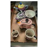 Flat of teapots and dishes