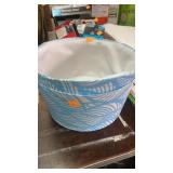 Two blue fabric baskets