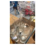 5 drinking glasses & plastic pitcher