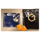 Necklace with opal.  Brooch with stone.