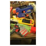 4 toy guns and sword