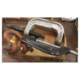 2 clamps and an iron link/connection