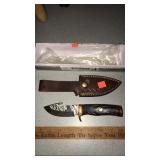 9" knife w/ sheath.