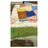 2 blankets.  1 smal quilt / lap covering.