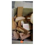 Box of wood and dowel rods for Bookends