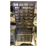 Two sorter drawer storage units.  Some